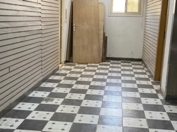 محل للبيع فى المهندسين مؤجر بعائد شهرى 50م  فى شارع السودان الرئيسى   .